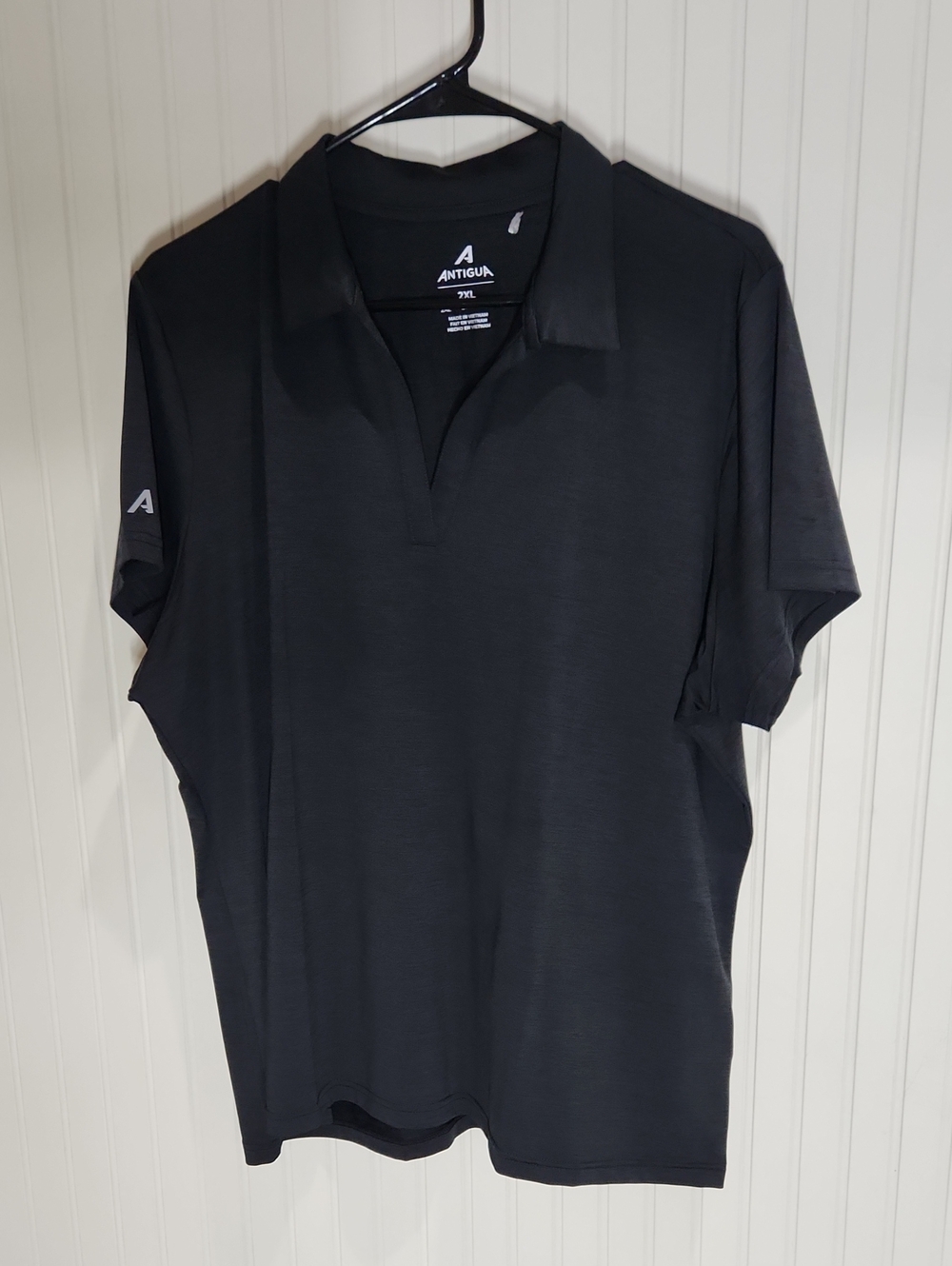 Antigua Black Short-Sleeve Polo with Open Collar